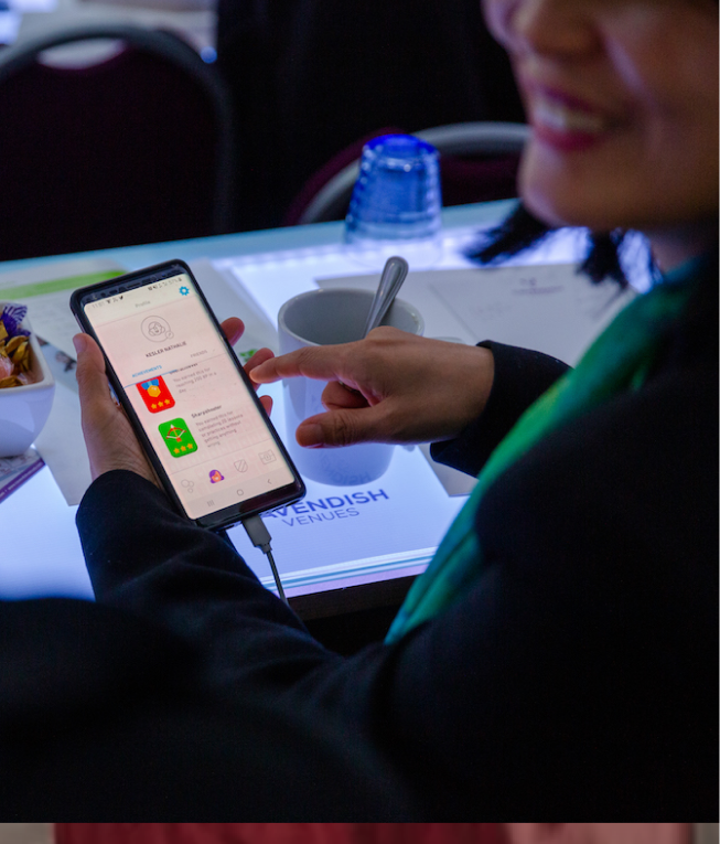 Attendee using the Duolingo app at Duocon