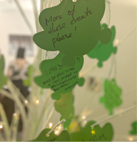 Duo-shaped paper leaves hanging on a tree