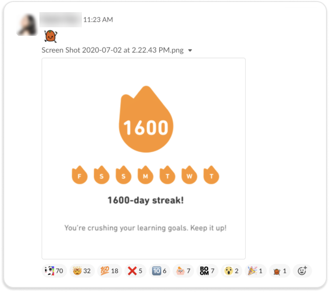 Screenshot of a Duolingo employee celebrating her 1600 day streak on Slack